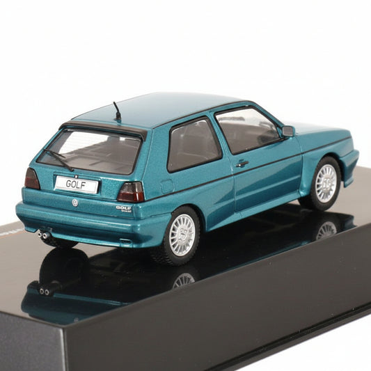 VW Golf Rally G60 1990 greenmetallic mit Vitrine
